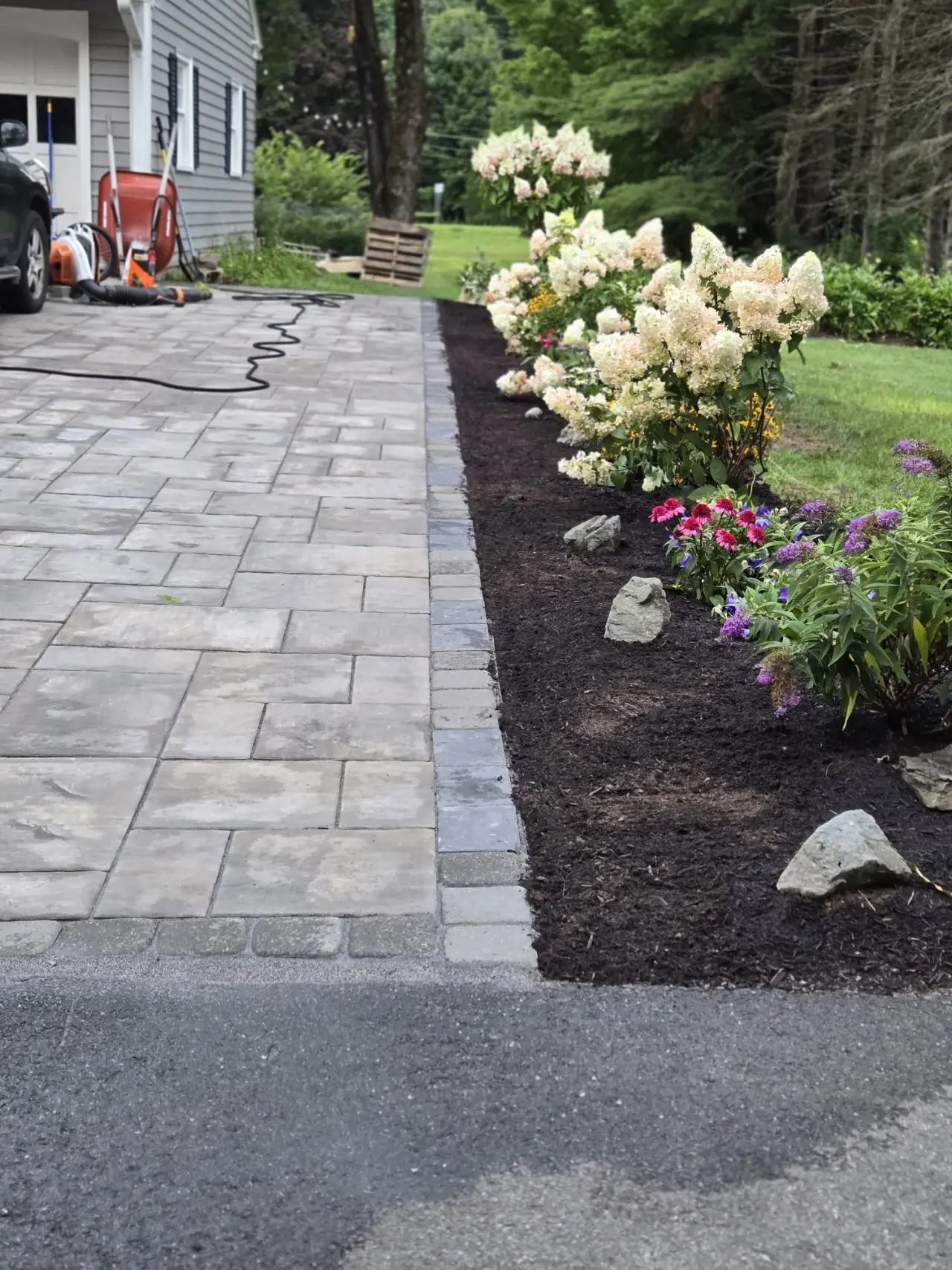 Hardwood mulch installed in Massachusetts garden bed